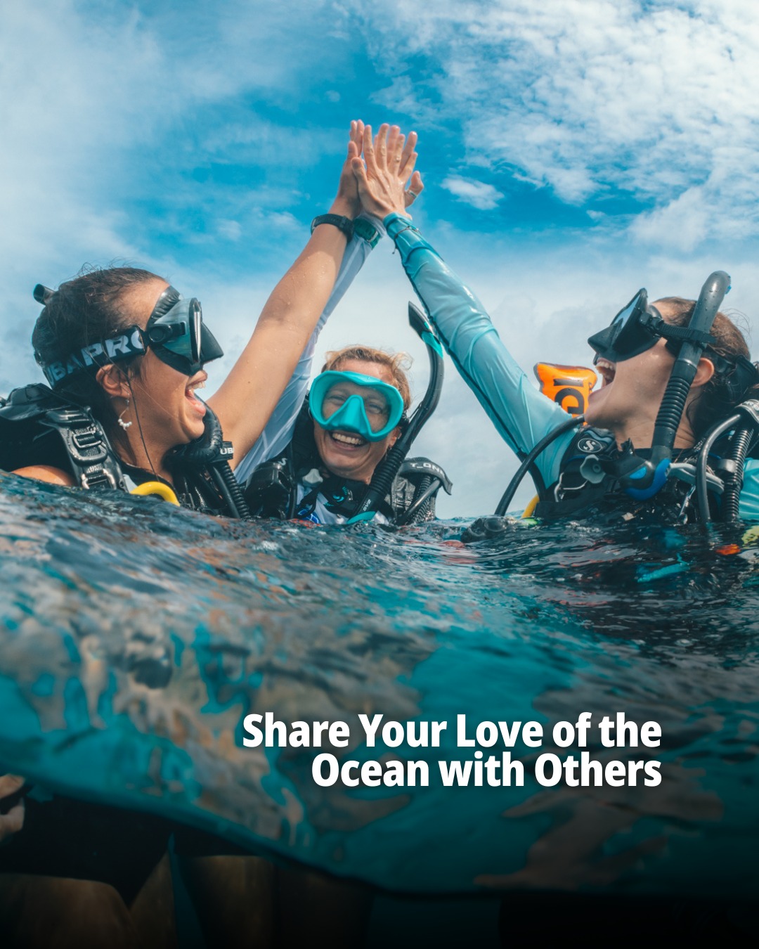 People in wetsuits at surface