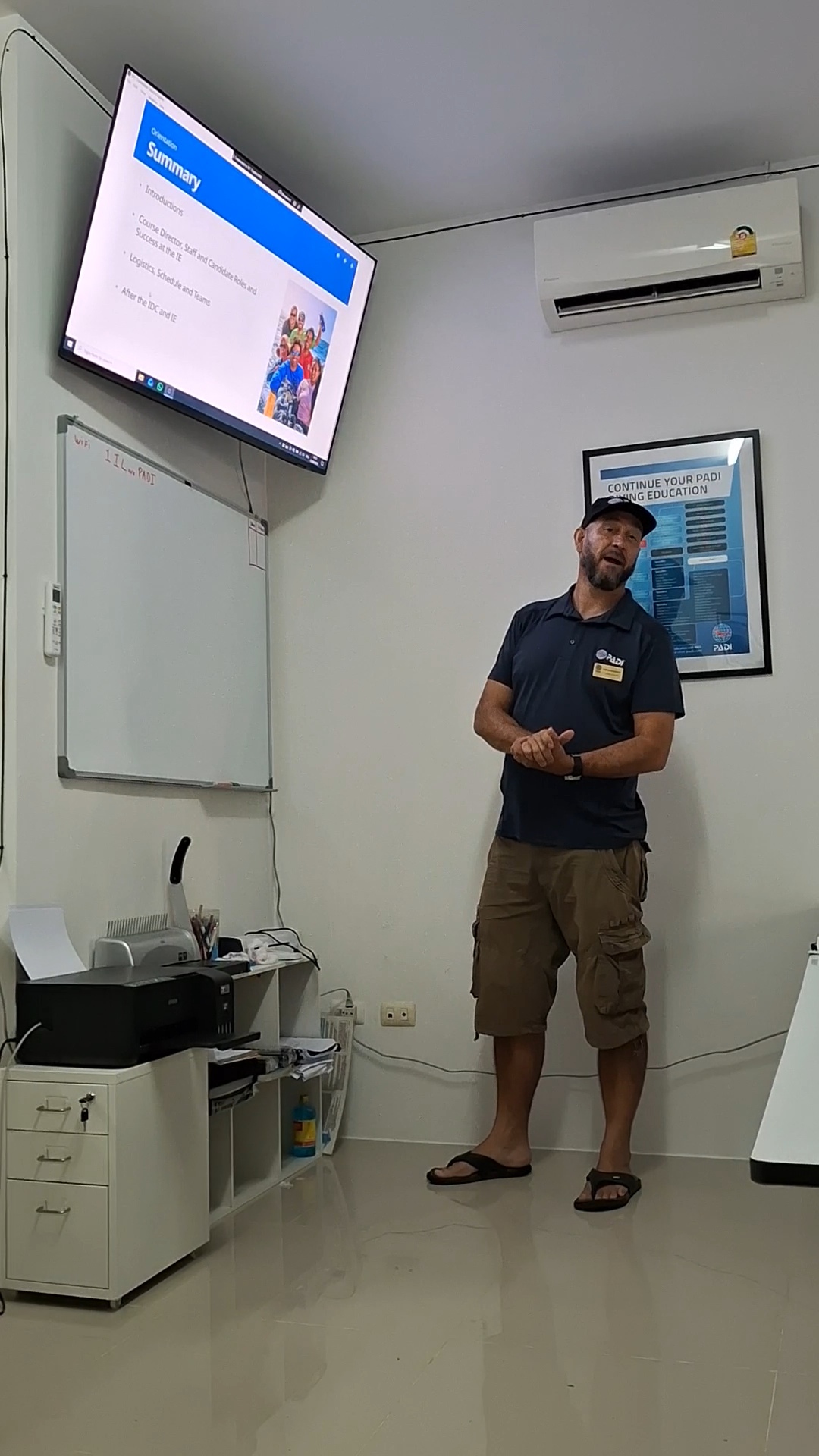 Instructor delivering a classroom presentation during a PADI IDC